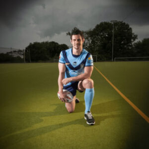 Joe McLean in rugby kit on sports ground