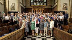 The 1974 St Mary's Reunion group in The Chapel, University of Gloucestershire