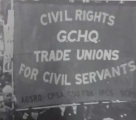 Banner from a march against the banned industrial action reading "Civil rights GCHQ, trade unions for civil servants".