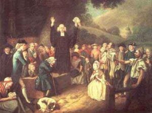 Painting of George Whitefield preaching outdoors, by John Collett.