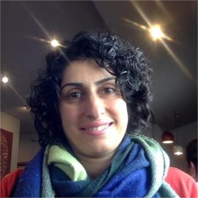 Headshot of Legha Momtazian.