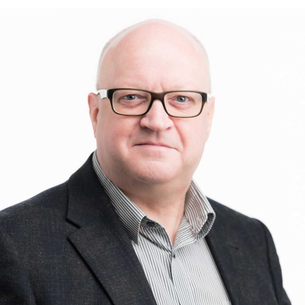 Headshot of Stuart Harrison.