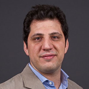 Headshot of Tamer Darwish smiling.