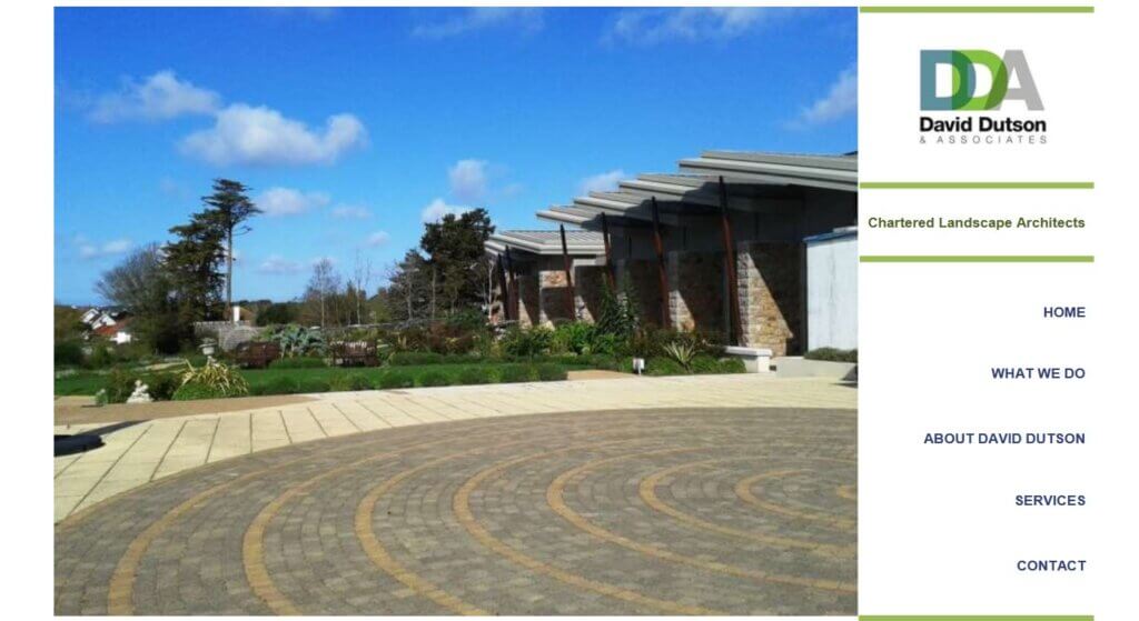 A photo of a building exterior with landscaped gardens with David Dutson & Associates logo.
